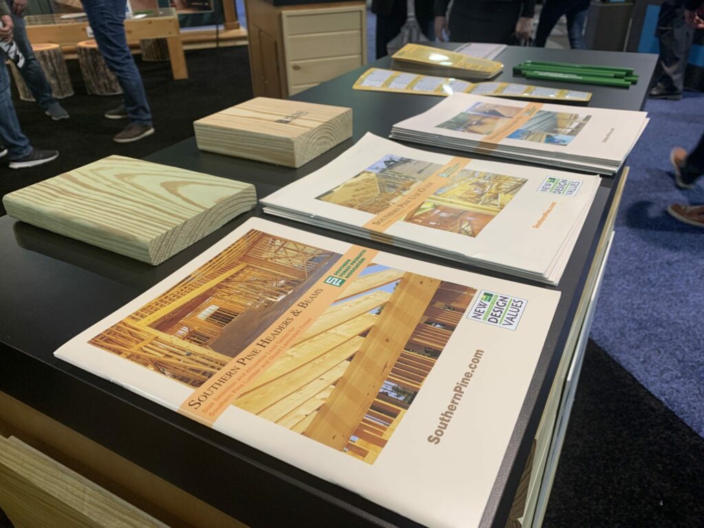 The SFPA desk at the ThinkWood booth at IBS 2020 included publications, span cards, and a few samples for visitors to handle.